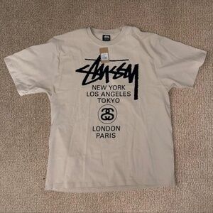 ‼️STÜSSY WORLD TOUR TEE – SIZE L (NEW WITH TAGS)